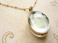 Oval Beveled Glass Locket Necklace: Gold Tone Heirloom Keepsake product logo