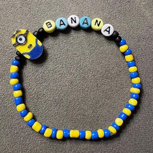 Minions- Perlenarmband- 18 cm - Bob- Banana- Universal Studios- Minions Film