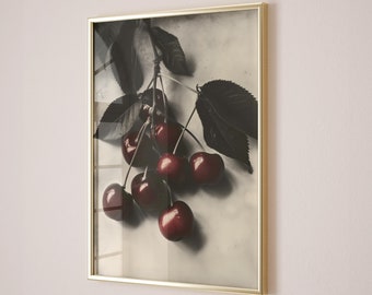 May include: A framed photograph of a branch of cherries with dark red cherries hanging from the branch. The background is a light gray.