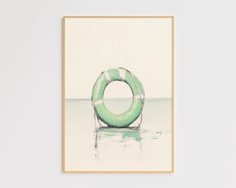 May include: A framed painting of a green life preserver floating in the water. The life preserver has a white stripe around it and is tied with a rope. The background is a light blue and white.