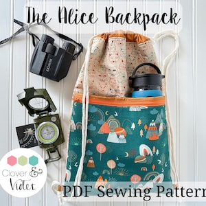 May include: A PDF sewing pattern for a drawstring backpack called "The Alice Backpack". The backpack is made of a teal fabric with a mountain and rainbow pattern. The pattern also includes a cream fabric with a fox print. The backpack is shown with a water bottle and a compass.