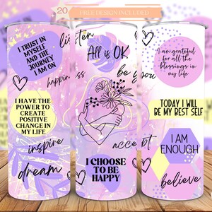 May include: Three stainless steel tumblers with motivational quotes and abstract designs in shades of purple, pink, and yellow. The quotes are "I trust in myself and the journey I am on", "I have the power to create positive change in my life", "I am grateful for all the blessings in my life", "Today I will be my best self", "I am enough", and "I choose to be happy".