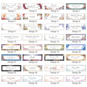May include: A collection of 32 nameplates with various floral designs and text. Each nameplate features a name, title, and design number. The color palette includes white, gold, and a variety of floral colors.