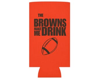 May include: Orange can cooler with a black football and the text "The Browns Make Me Drink".