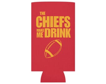 May include: Red can cooler with the text "The Chiefs Make Me Drink" in yellow letters and a yellow outline of a football.