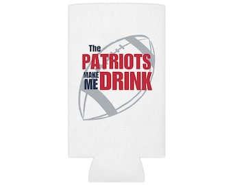 May include: White can cooler with a gray and white football graphic and the text "The Patriots Make Me Drink" in red and blue.