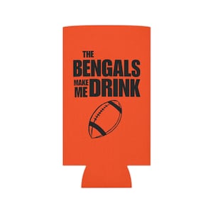 May include: Orange can cooler with black text that reads "The Bengals Make Me Drink" and a black and white football graphic.