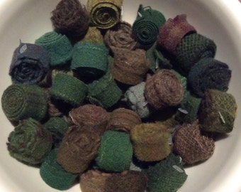 Hand dyed wool fabric coils; greens