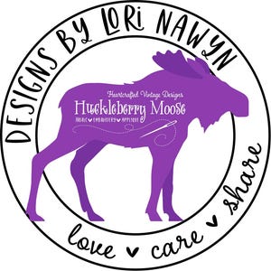 May include: A circular logo with a purple moose silhouette. The text "DESIGNS BY LORI NAWYN" arches around the top, and "love care share" curves along the bottom. Inside the moose is "Huckleberry Moose" and "FABRIC EMBROIDERY APPLIQUE".