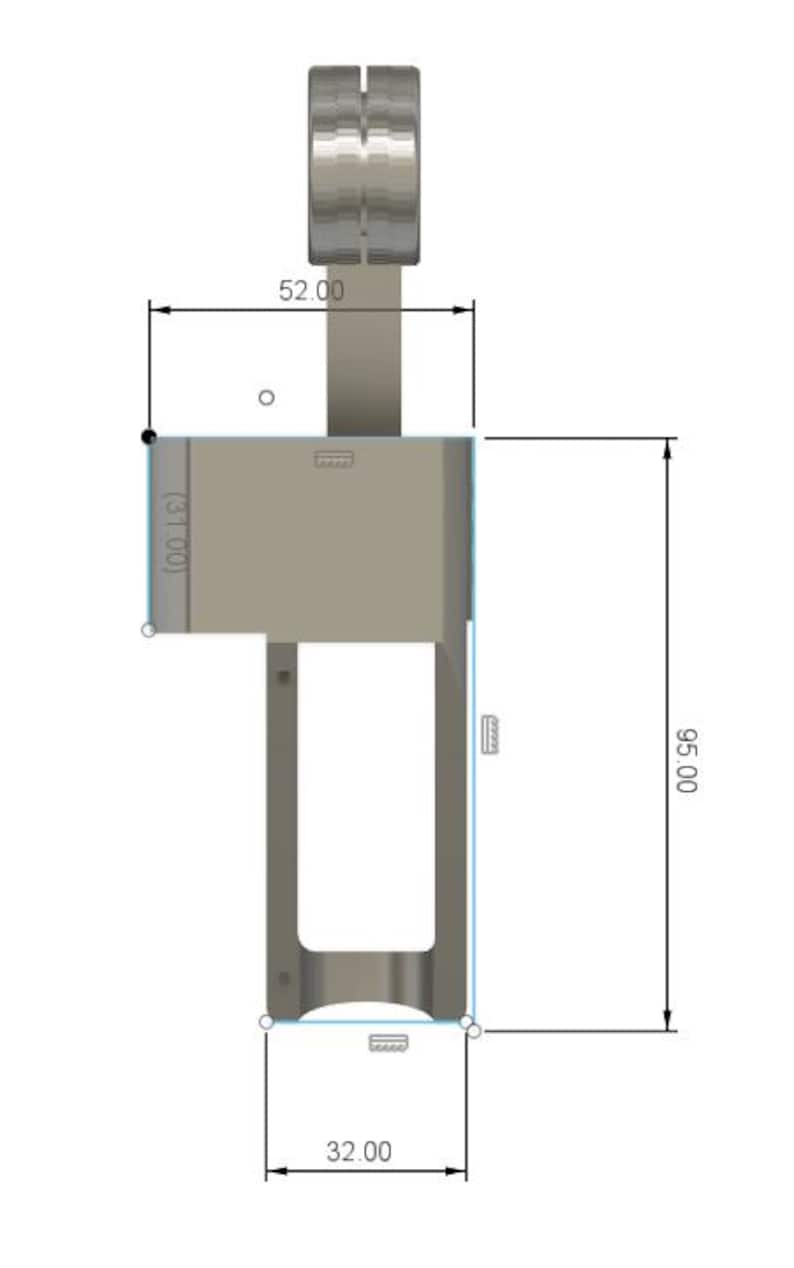May include: A technical drawing of a metal component, featuring a cylindrical top section connected to a rectangular body. Dimensions are indicated: 95.00 mm height, 32.00 mm width, and 52.00 mm length. The design includes a curved base.