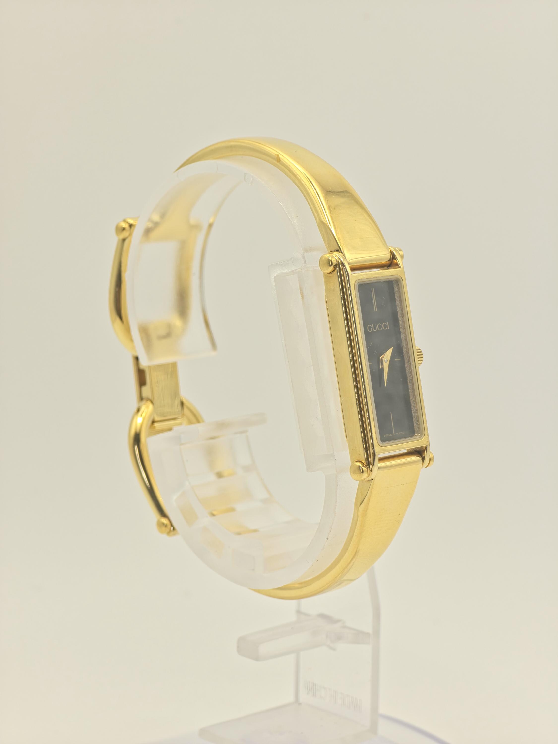 Gucci 0707/1500 15th Anniversary Gold Bangle Women's Swiss Watch