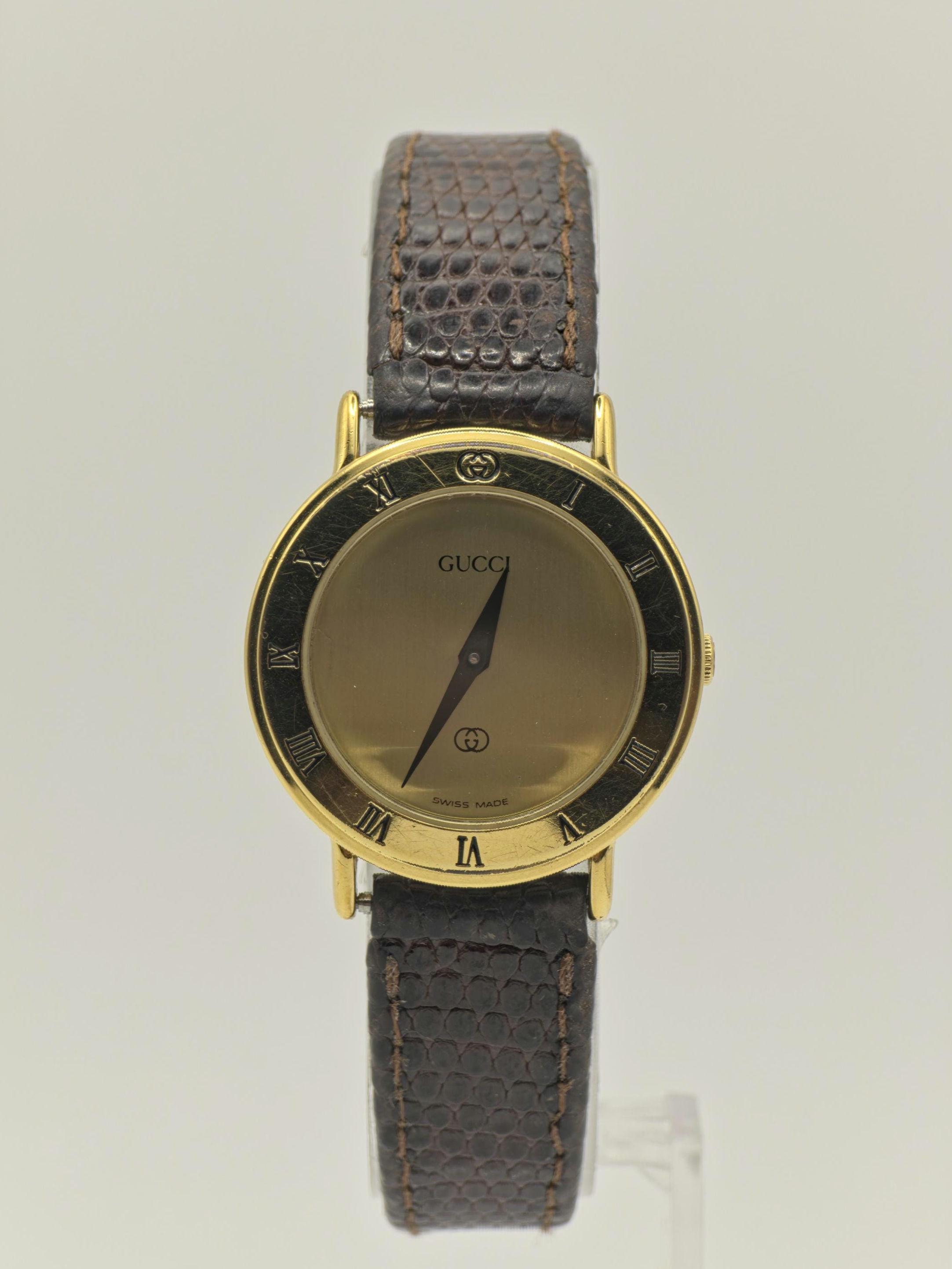 Gucci  Watch with brown leather band 
In working condition with new battery Gucci G-Timeless Quartz Analog Leather Watch, 40mm  main image 2