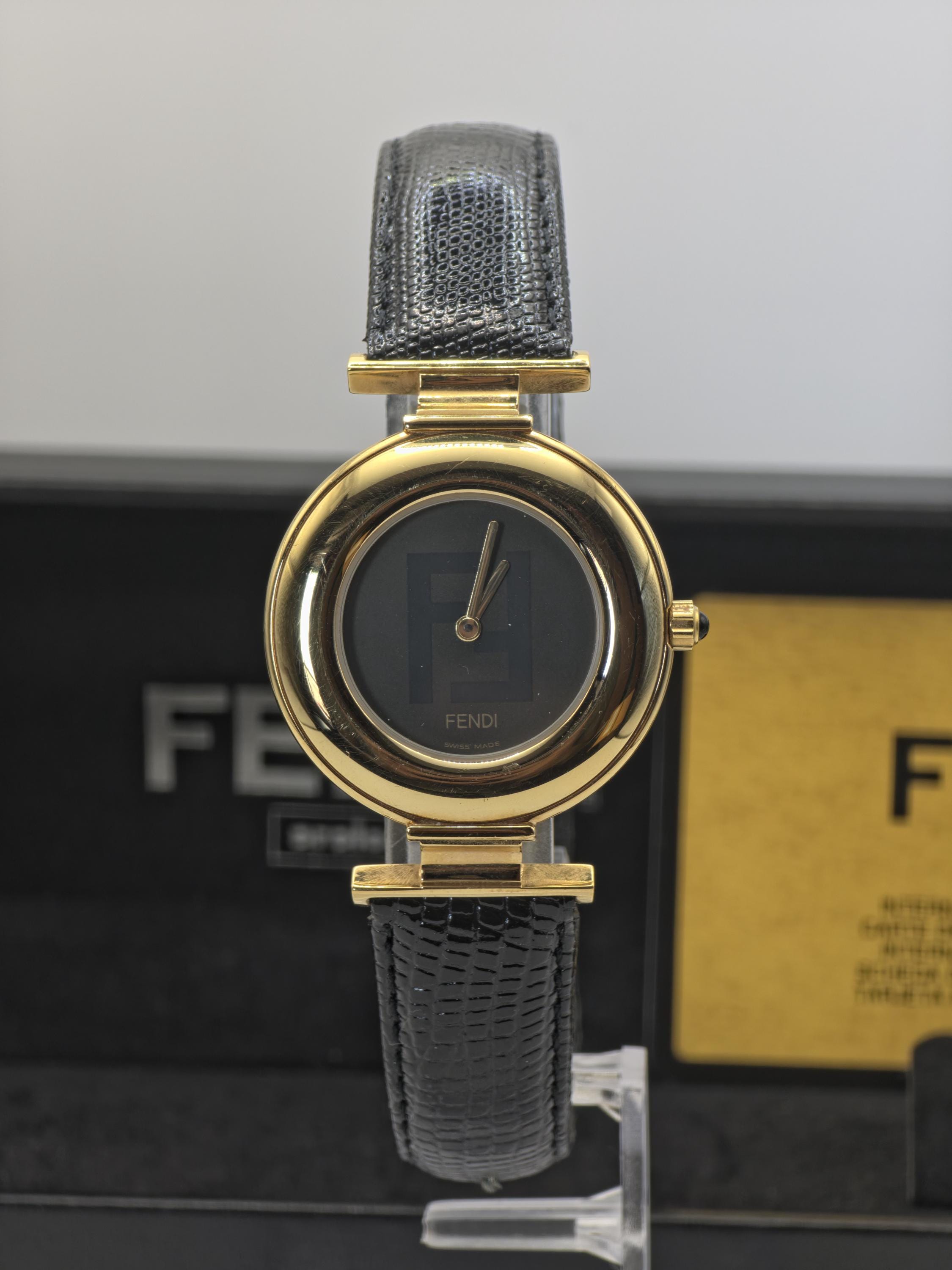 Fendi 320G Quartz Wristwatch Black Dial Gold Tone Case Leather Fendi 320G Quartz Wristwatch Black Dial Gold Tone Case Leather