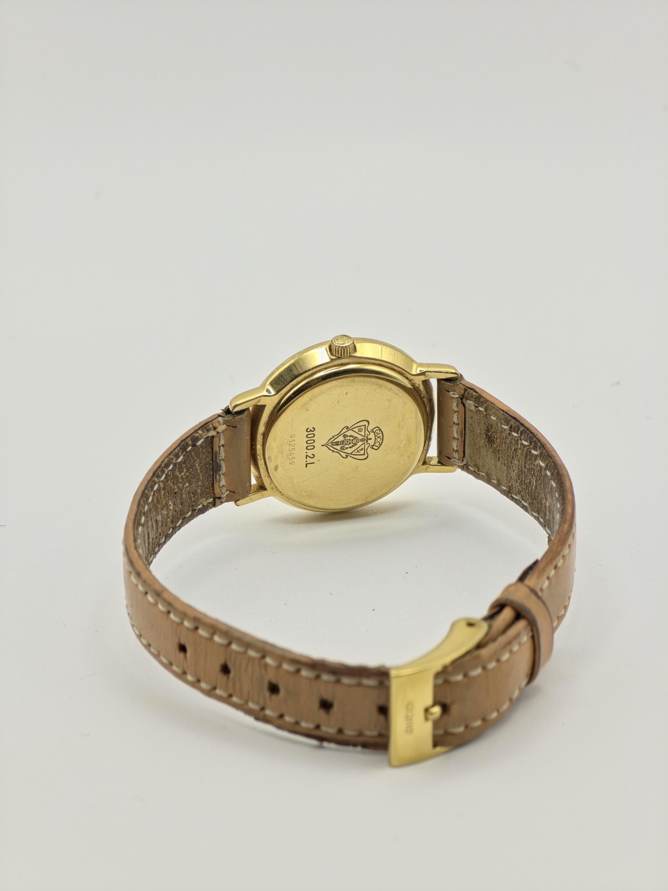 Gucci 3000.2.L Gold Tone Cream Dial Small Seconds Women Watch