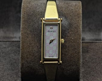 Gucci 7800L Unisex Watch – Black Leather Cuff Strap – Rectangular
