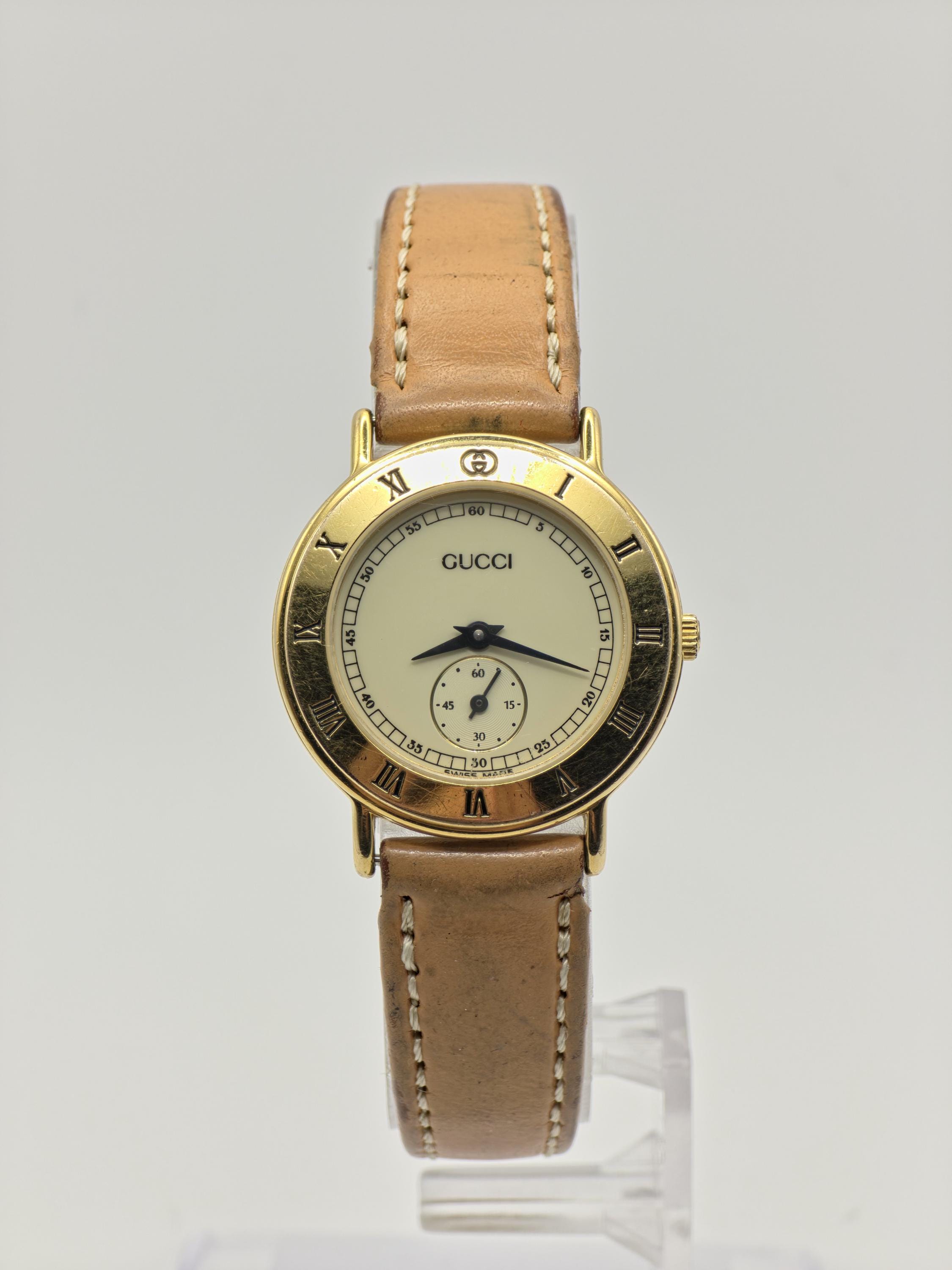 Gucci 3000.2.L Gold Tone Cream Dial Small Seconds Women Watch