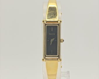 Gucci 0707/1500 15th Anniversary Gold Bangle Women's Swiss Watch