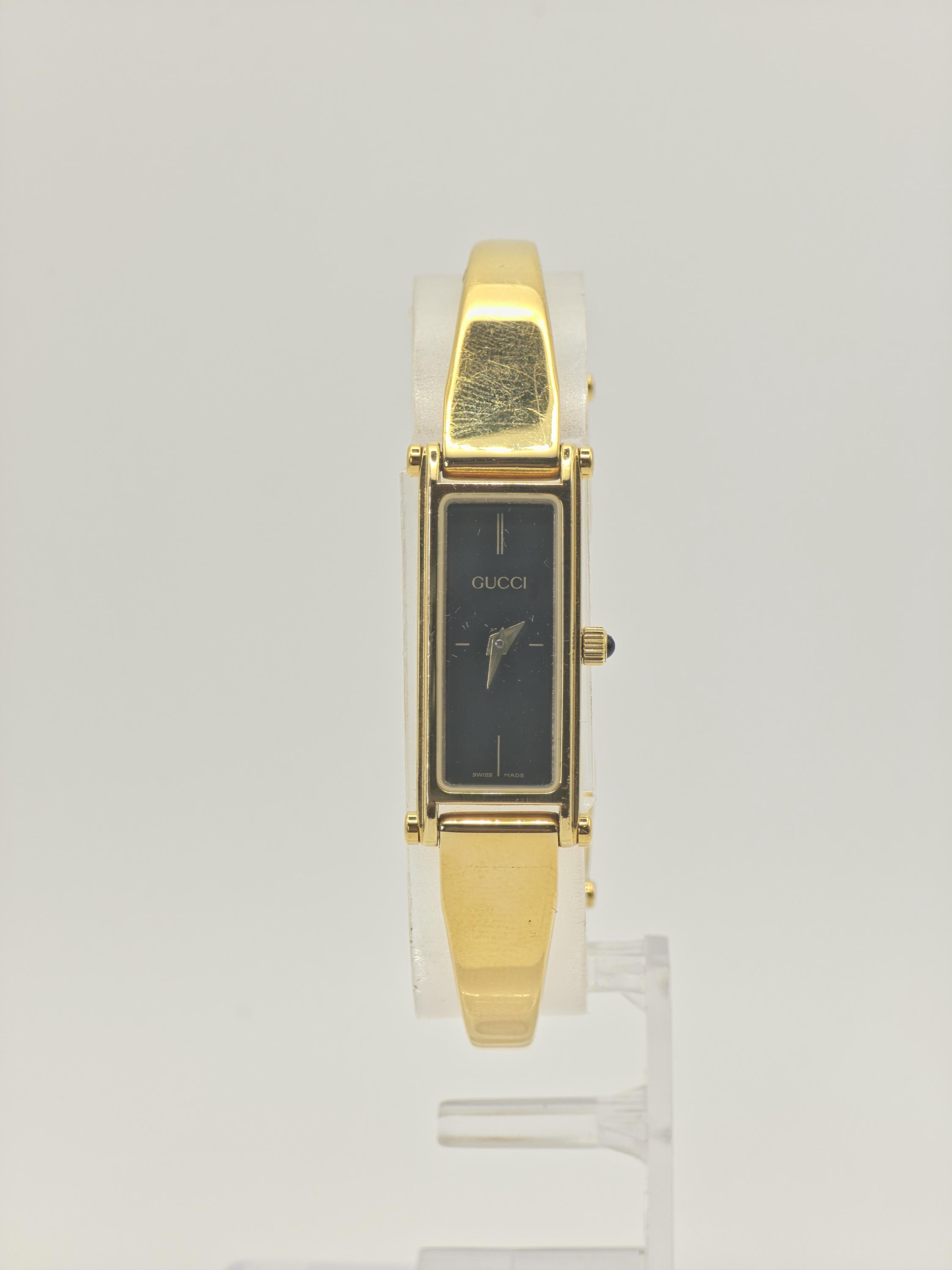 Gucci 0707/1500 15th Anniversary Gold Bangle Women's Swiss Watch
