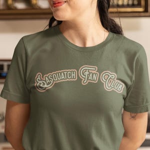 Sasquatch Fan Club Unisex Tee, Funny Graphic T-Shirt, Cotton Casual Wear, Gift for Outdoor Lovers, Perfect for Camping or Parties