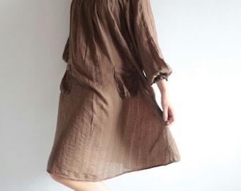 Vestido 100% algodão, comprimento até o joelho, modelagem solta...tamanho único