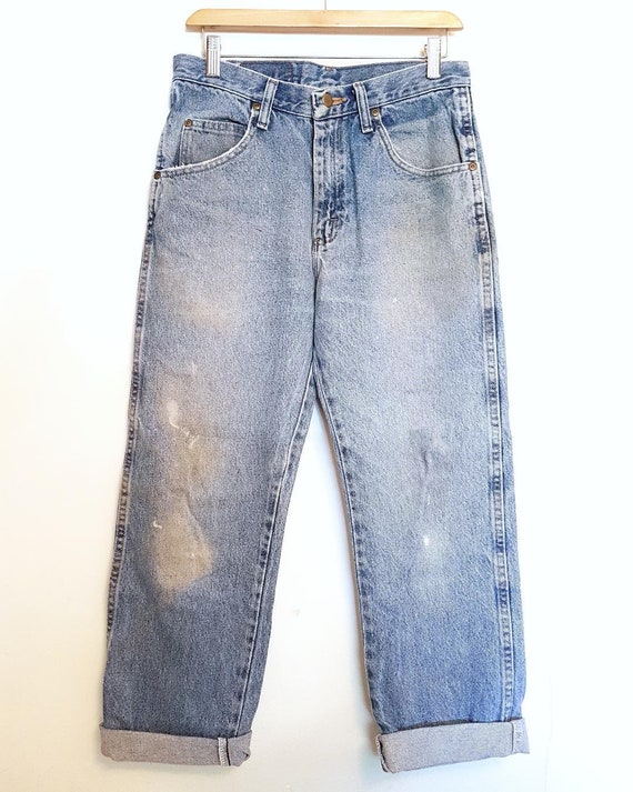 worn out wrangler jeans