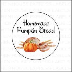 May include: A round white sticker with a black border. The sticker has a watercolor illustration of pumpkin bread and wheat stalks. The text "Homemade Pumpkin Bread" is written in black cursive font.