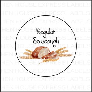 May include: A white circle label with a black border, featuring a watercolor illustration of sliced sourdough bread with wheat stalks. The text "Regular Sourdough" is written in black.