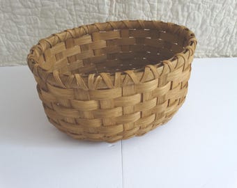Hand Woven Basket in Golden Oak with wood base.  Oval basket.  Custom made baskets. Traditional handmade baskets.