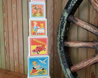 Vintage Nesting Blocks with great Lithograph designs
