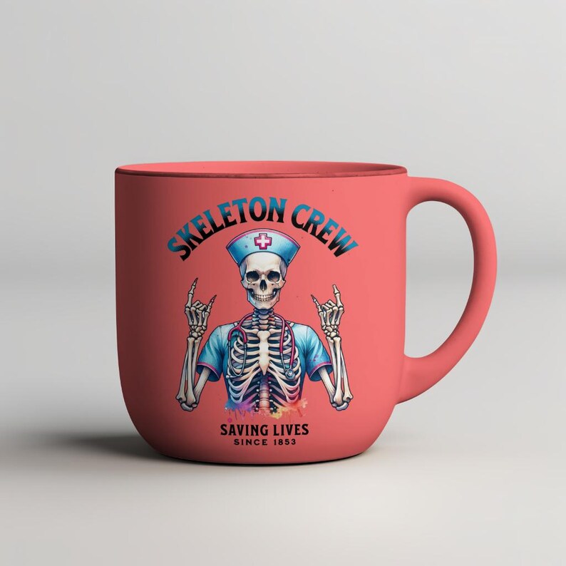 May include: A pink ceramic mug with a skeleton wearing a nurse's uniform and a stethoscope. The mug has the text "Skeleton Crew Saving Lives Since 1853".