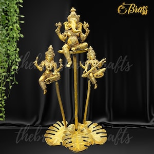 Ganesha, Lakshmi & Saraswati statues seated on pure brass plants, Unique Ganesha, laxmi saraswati idols for home decor and Gifting by TBH