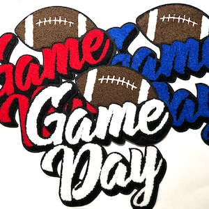 May include: Game Day patch with three footballs and the words "Game Day" in red, white, and blue.