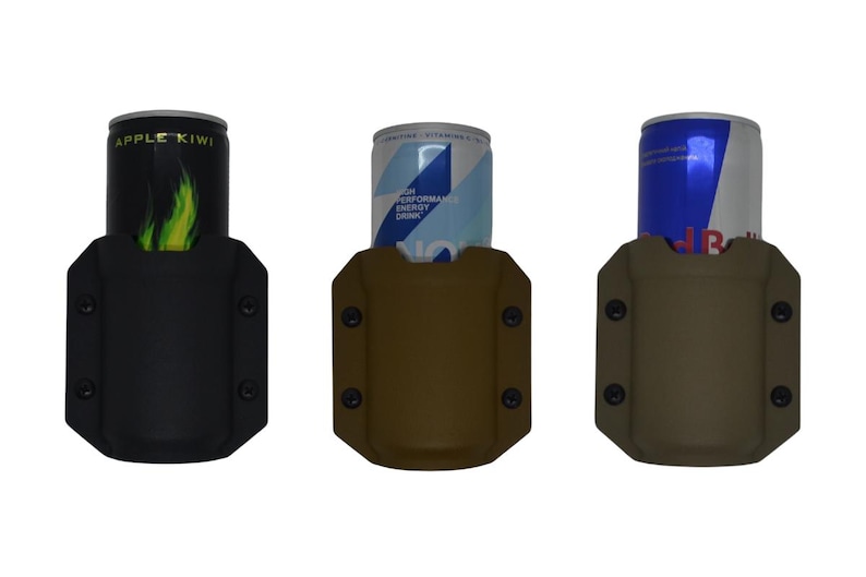 May include: Three beverage can holders in black, brown, and tan. Each holder has a can of energy drink inside. The black holder has an Apple Kiwi can, the brown holder has a blue and white can, and the tan holder has a Red Bull can.