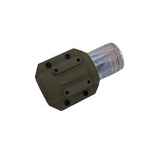 May include: An olive-drab colored can holder with a Red Bull energy drink can. The holder has a rectangular shape with rounded edges and several black screws. The can is silver with red and blue text.