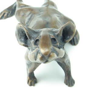 Pugnacious mouse bronze sculpture around 7 inches nose tip to tail tip. Objet d'art metal ornament and luxury paperweight.