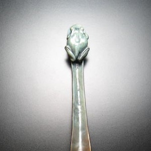 Tree frog shoe horn. Bronze sculpture, edition of 25