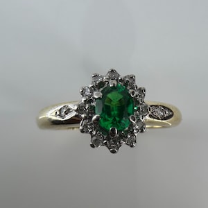 9ct Emerald and Diamond Cluster Ring. Ref: SH5205