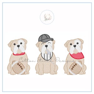May include: Embroidered design featuring three cartoon bulldogs. One wears a referee shirt and cap, another a red bandana, and the third a red bandana. Each dog holds a football. The design is set against a white background.