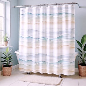 May include: A shower curtain featuring a repeating horizontal pattern of abstract ocean waves in shades of light blue, teal, and sandy beige against a white background, suspended from a silver metal rod with circular rings.