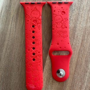 Video Game themed. Astro Bot engraved design on a silicone watch band compatible with Apple Watch and Samsung Galaxy Watch.