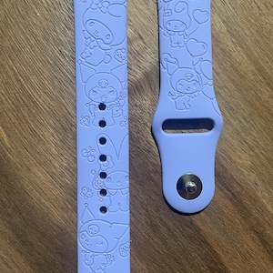 Cute rabbits themed engraved design on a silicone watch band compatible with Apple Watch and Samsung Galaxy Watch.