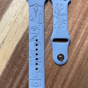 Nurse appreciation themed engraved design on a silicone watch band compatible with Apple Watch and Samsung Galaxy Watch.
