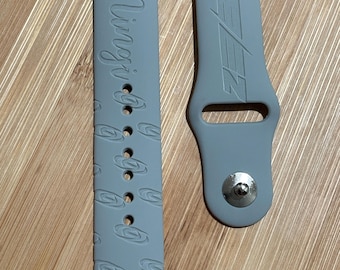 Ateez Bias K pop themed engraved design on a silicone watch band compatible with Apple Watch and Samsung Galaxy Watch.