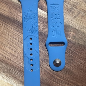 Anime themed engraved design on a silicone watch band compatible with Apple Watch and Samsung Galaxy Watch.