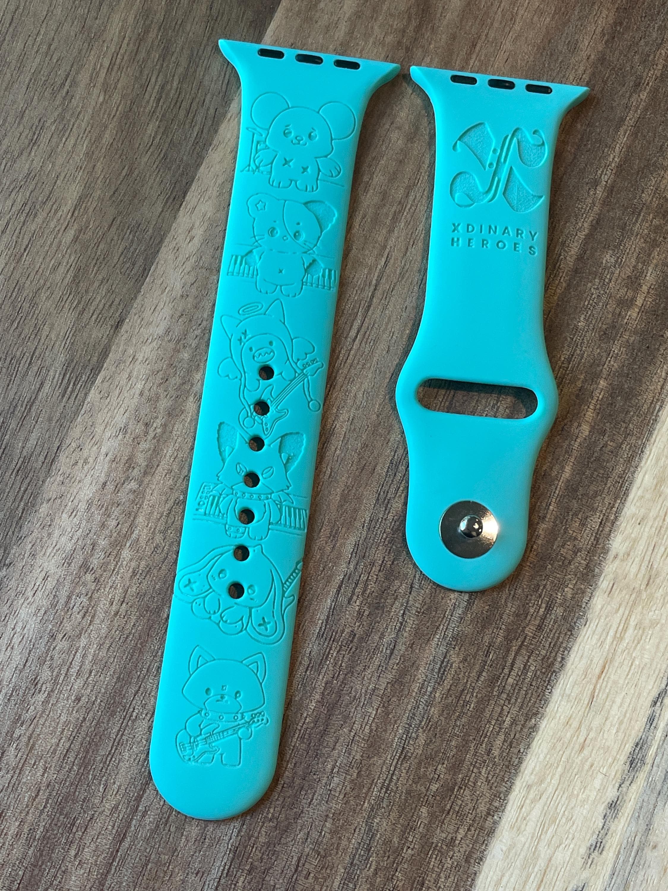 K pop themed. Xdinary Heroes engraved design on a silicone watch band compatible with Apple Watch and Samsung Galaxy Watch.
