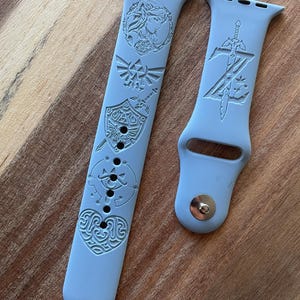 Video Game themed. Zelda engraved design on a silicone watch band compatible with Apple Watch and Samsung Galaxy Watch.