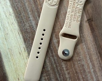 Diseño grabado con temática de emergencia y registro médico en una correa de reloj de silicona compatible con Apple Watch y Samsung Galaxy Watch.