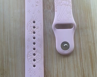 Cute moon girl themed engraved design on a silicone watch band compatible with Apple Watch and Samsung Galaxy Watch.