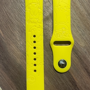 Anime electric character themed engraved design on a silicone watch band compatible with Apple Watch and Samsung Galaxy Watch.