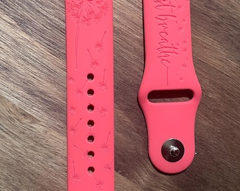 Just breathe engraved design on a silicone watch band compatible with Apple Watch and Samsung Galaxy Watch.